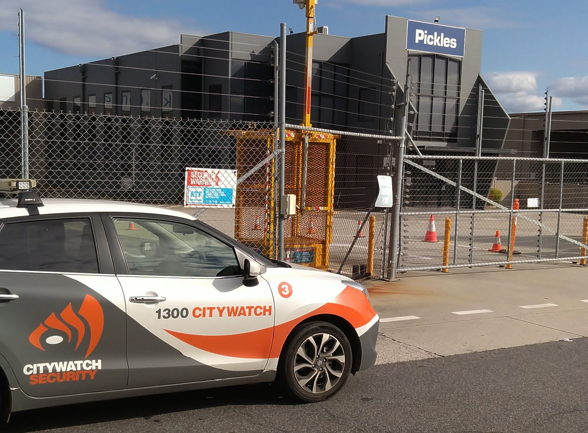 One of our trained security guards monitoring a facility in Melbourne